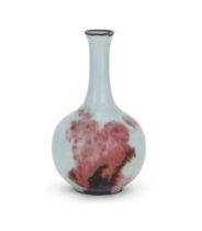 A Chinese celadon-ground underglaze red vase
