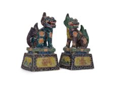 A pair of Japanese Kutani polychrome decorated temple dogs