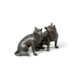 Two Japanese bronze models of Tanuki