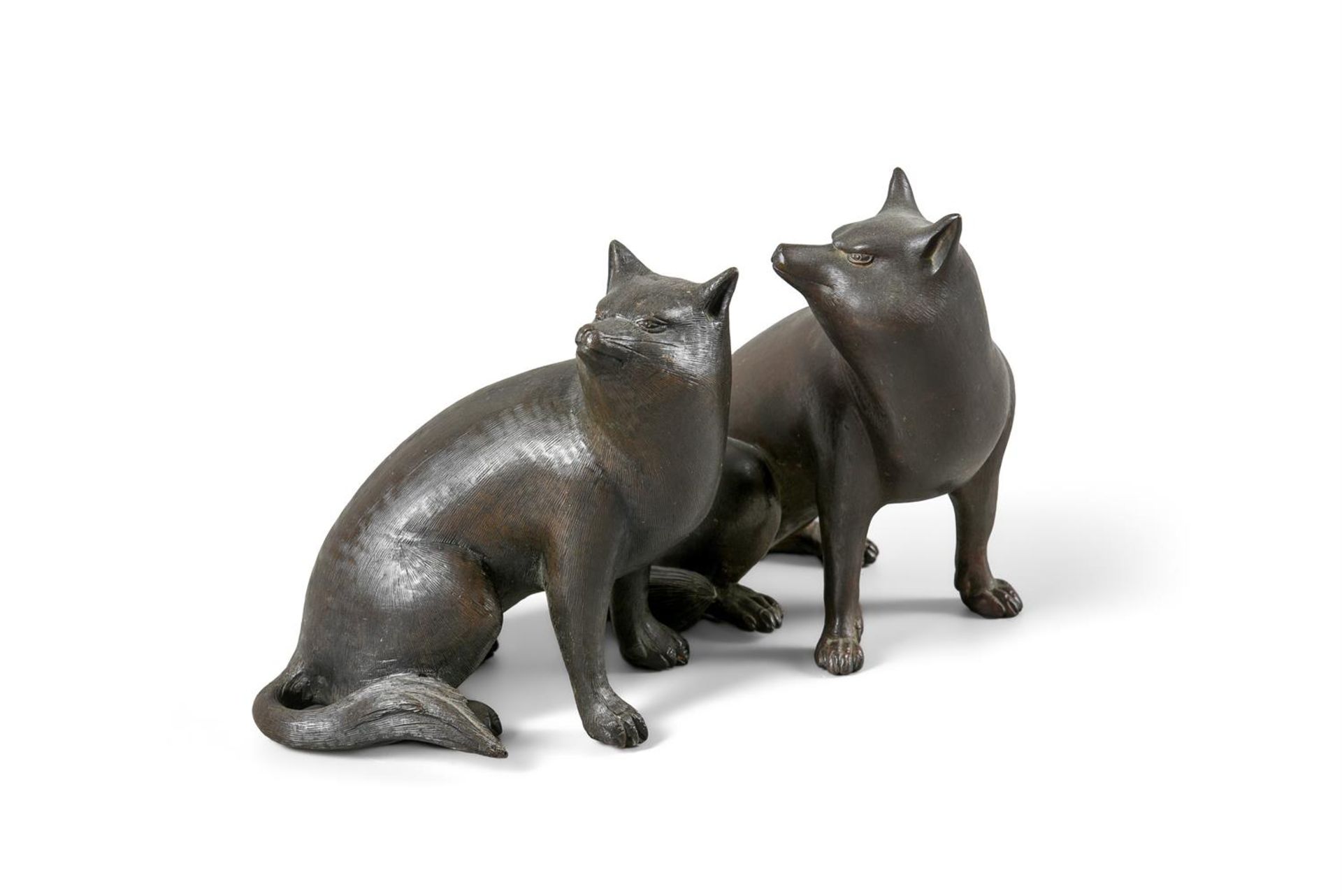 Two Japanese bronze models of Tanuki