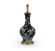 A Chinese Famille Noire vase
