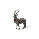 A Japanese bronze model of a stag
