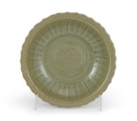 A large Chinese celadon glazed lobed plate