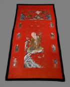A large Chinese red embroidered panel