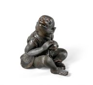 A Japanese bronze model of a Monkey