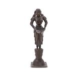 A bronze figure of Dipa Lakshmi