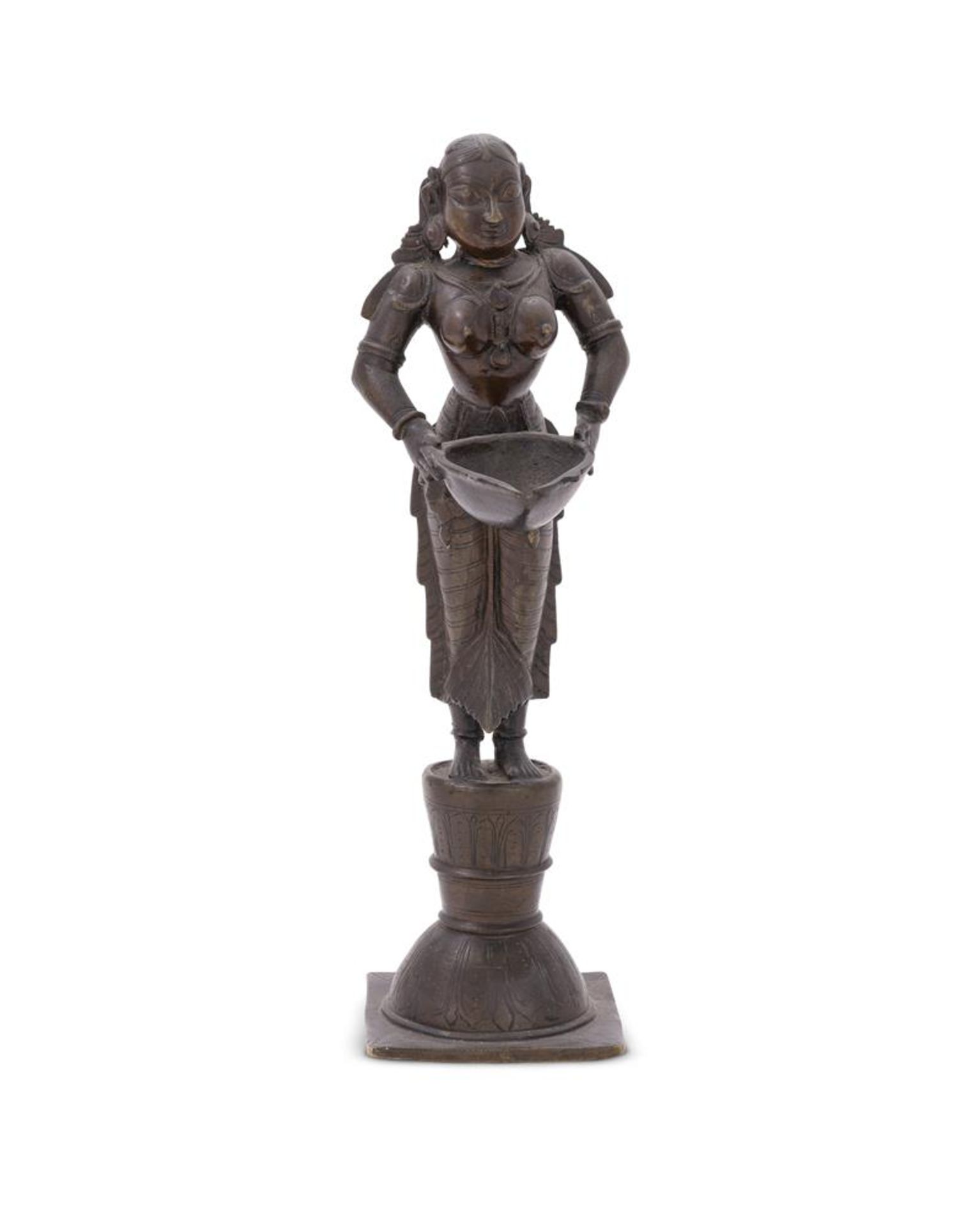 A bronze figure of Dipa Lakshmi