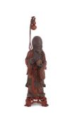 A large Chinese lacquered wood figure of the Shou Lao