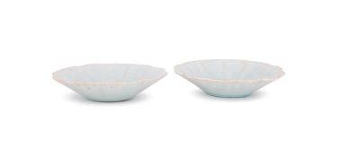 A pair of Chinese Qingbai 'Floral' saucers