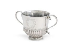 A WILLIAM III SILVER TWIN HANDLED PORRINGER