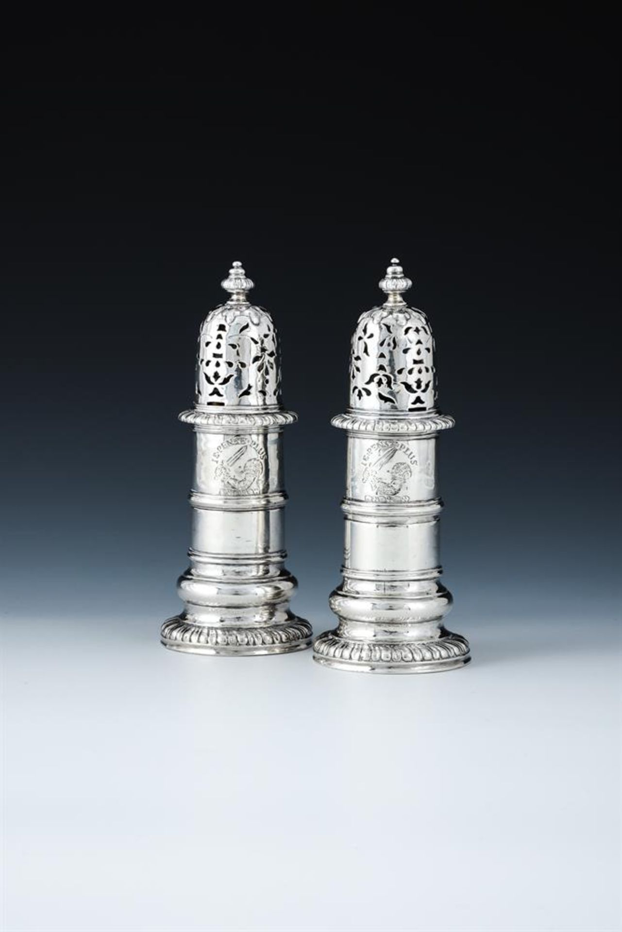 A PAIR OF QUEEN ANNE SCOTTISH SILVER LIGHTHOUSE CASTERS