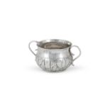 A CHARLES II SMALL SILVER TWIN HANDLED PORRINGER