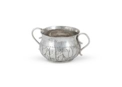 A CHARLES II SMALL SILVER TWIN HANDLED PORRINGER