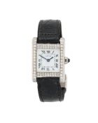 Y CARTIER, TANK, A LADY'S 18 CARAT WHITE GOLD AND DIAMOND WRIST WATCH
