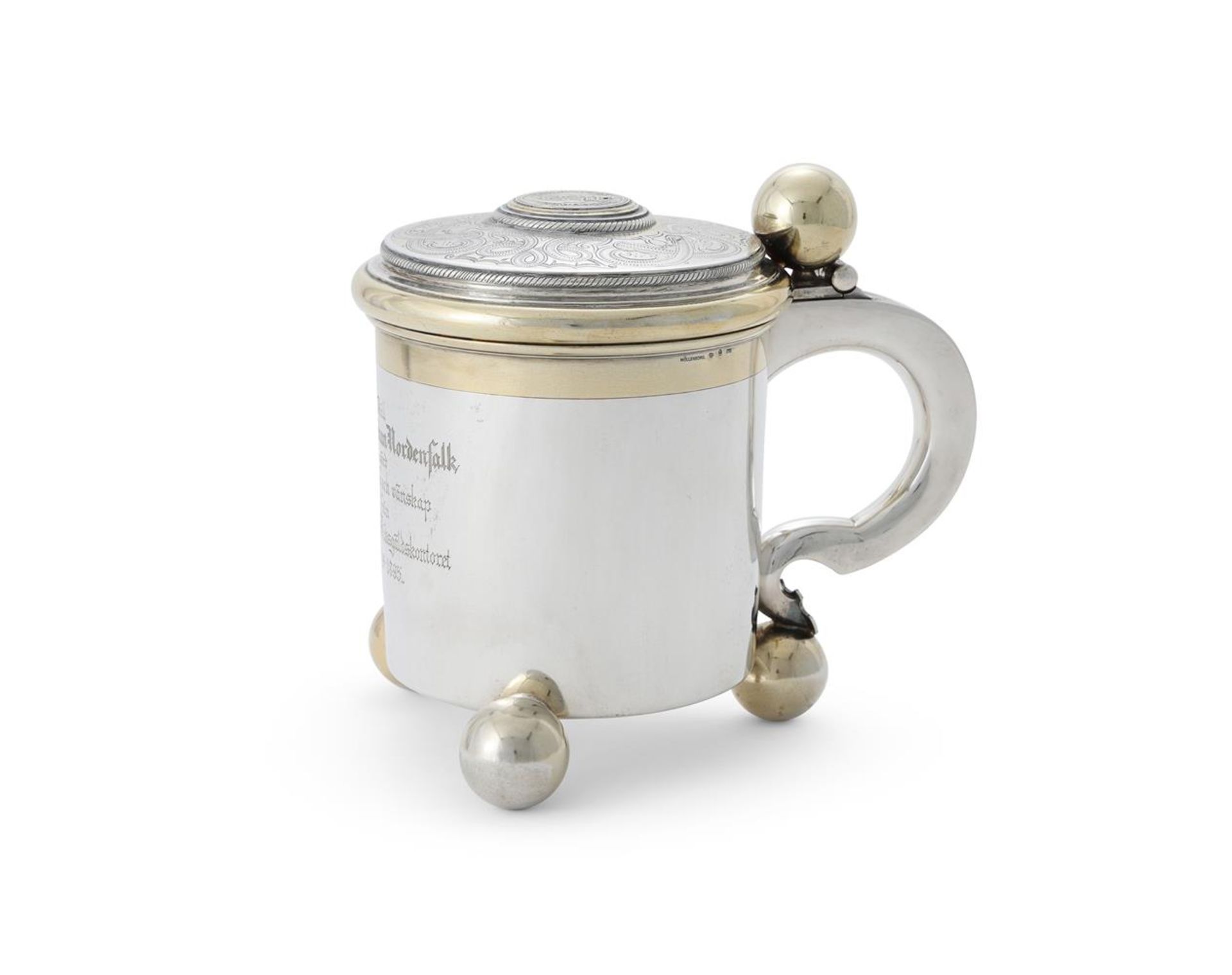 A SWEDISH SILVER AND SILVER GILT LIDDED TANKARD