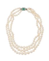 A THREE STRAND CULTURED PEARL NECKLACE TO AN EMERALD AND DIAMOND CLASP