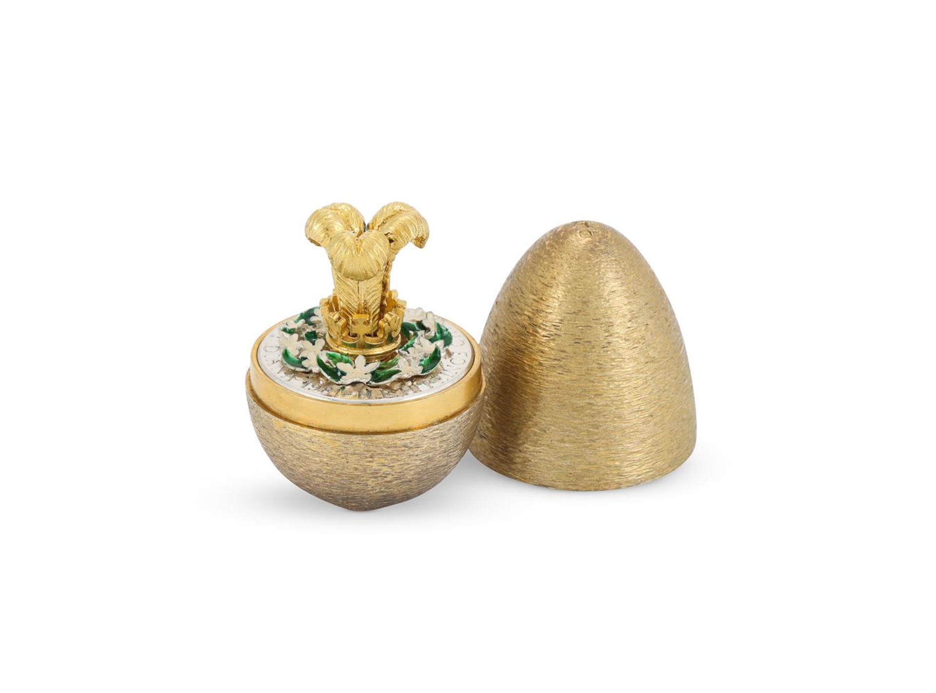 A SILVER GILT SURPRISE EGG