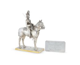 A SILVER MODEL OF A 21ST LANCER ON HORSEBACK