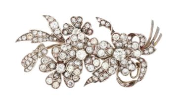 A MID 20TH CENTURY DIAMOND FLORAL SPRAY BROOCH