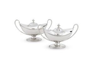 A PAIR OF GEORGE III SILVER OVAL PEDESTAL SAUCE TUREENS AND COVERS