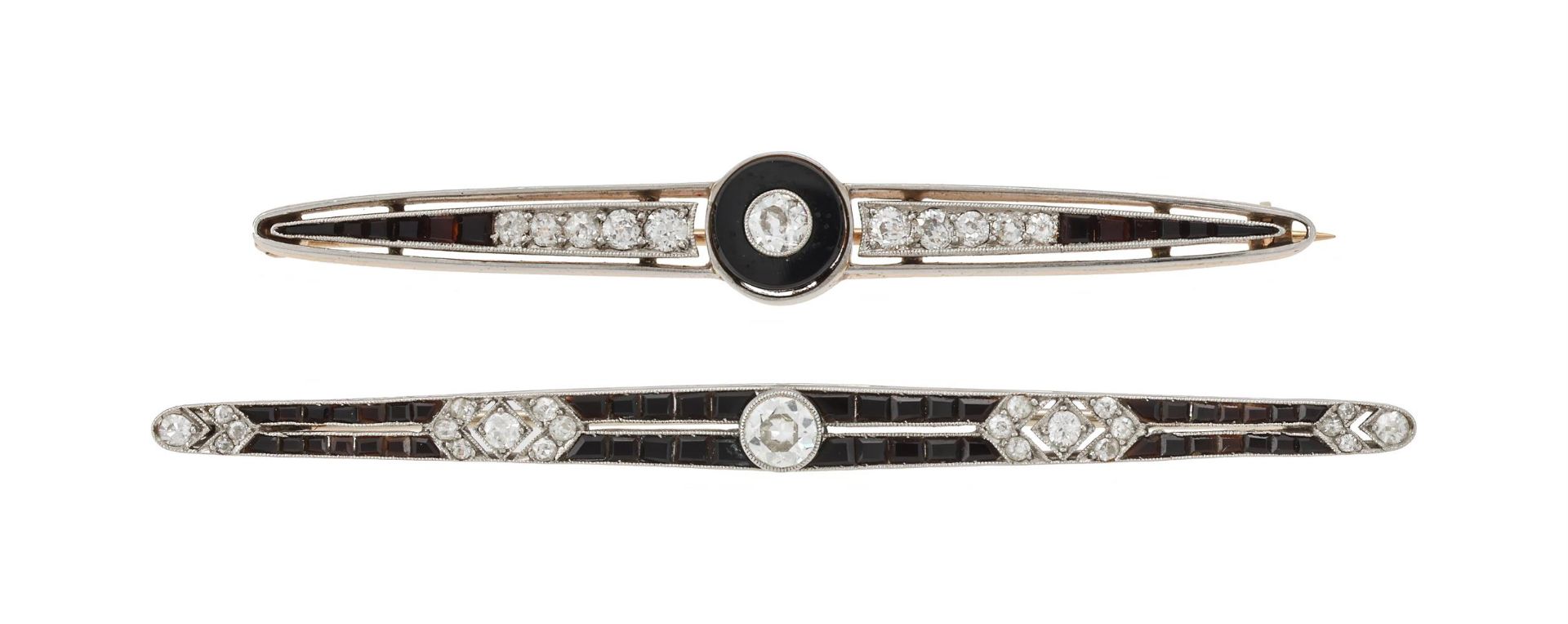 TWO ART DECO DIAMOND AND ONYX BAR BROOCHES, CIRCA 1920