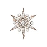 A DIAMOND STAR BROOCH