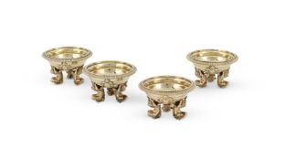 A SET OF FOUR 19TH CENTURY FRENCH SILVER GILT SALT CELLARS