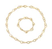 GEORG JENSEN, DUNE, AN 18 CARAT GOLD AND DIAMOND CHAIN NECKLACE AND BRACELET, NO. 1571A, LONDON 2016