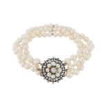 A CULTURED PEARL BRACELET WITH A DIAMOND AND CULTURED PEARL CLASP