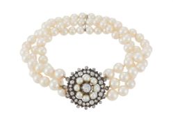 A CULTURED PEARL BRACELET WITH A DIAMOND AND CULTURED PEARL CLASP