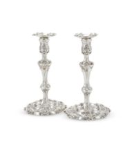 A PAIR OF GEORGE II SILVER CANDLESTICKS