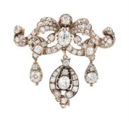 A VICTORIAN AND LATER DIAMOND SCROLLED BROOCH