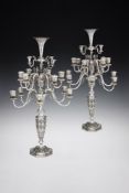 A PAIR OF MIDDLE EASTERN SILVER COLOURED NINETEEN LIGHT CANDELABRA