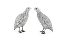 A MATCHED PAIR OF DUTCH SILVER PARTRIDGE DECANTERS
