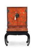 A PAIR OF CHINESE RED LACQUER AND PAINTED CABINETS ON LATER STANDS, 19TH CENTURY
