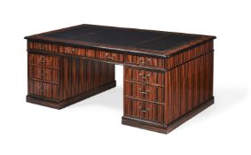 A COROMANDEL AND GILT TOOLED LEATHER INSET PARTNER'S DESK, OF RECENT MANUFACTURE
