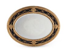AN EMPIRE GILTWOOD AND VELVET OVAL MIRROR, EARLY 19TH CENTURY