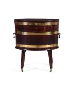 A GEORGE III MAHOGANY AND BRASS BOUND OVAL WINE COOLER, CIRCA 1780