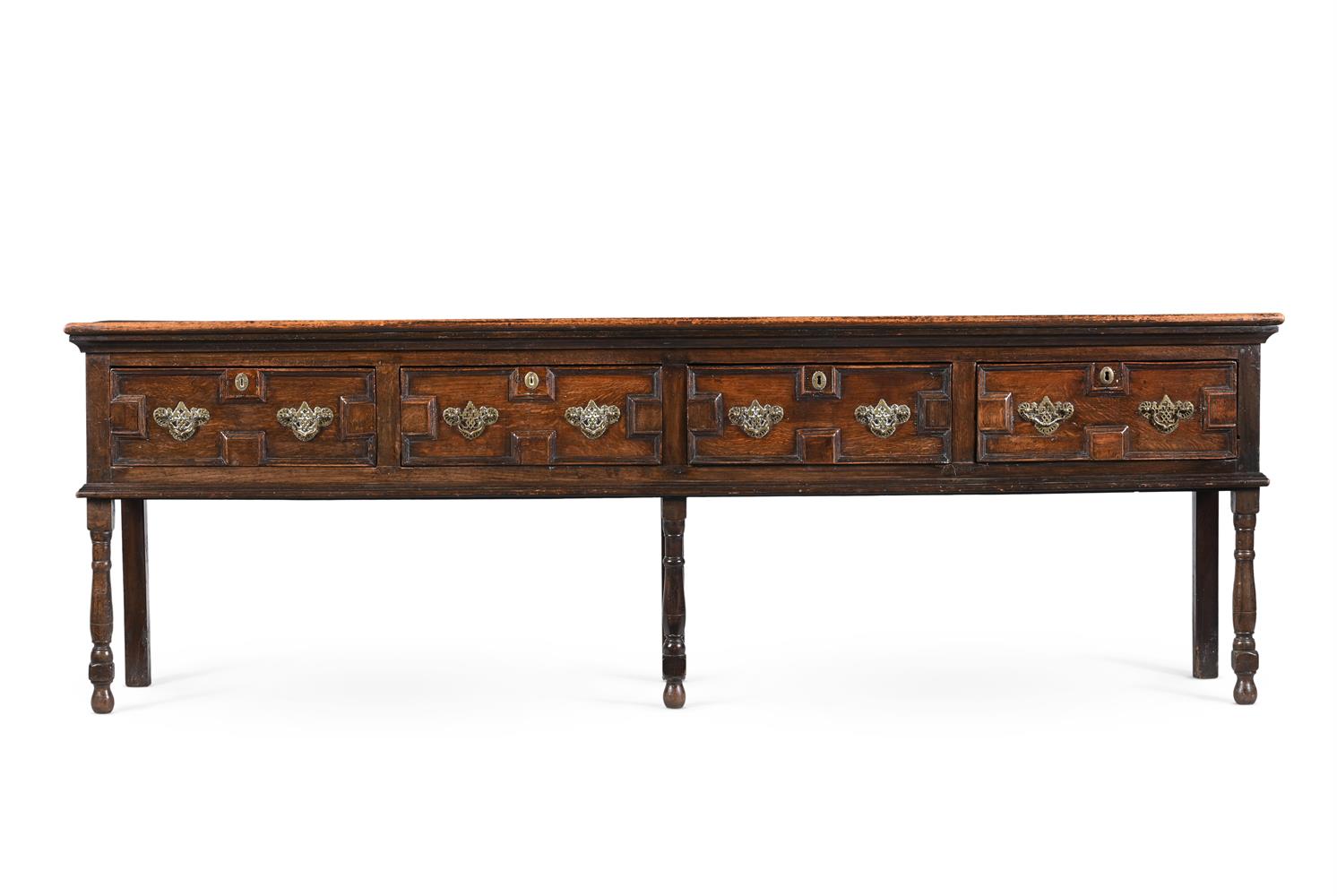 A CHARLES II OAK DRESSER BASE, CIRCA 1670