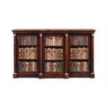 Y A REGENCY ROSEWOOD AND GILT METAL MOUNTED BREAKFRONT BOOKCASE, CIRCA 1820