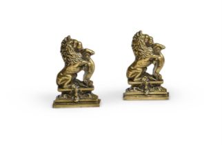 A PAIR OF VICTORIAN BRASS DOOR PORTERS, MID 19TH CENTURY