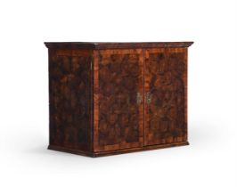 A WILLIAM & MARY OLIVEWOOD OYSTER-VENEERED TABLE CABINET, CIRCA 1690