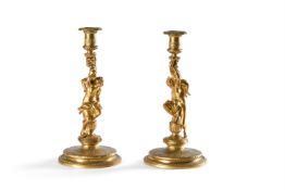 A LARGE PAIR OF ORMOLU FIGURAL CANDLESTICKS, IN THE MANNER OF CORNEILLE VAN CLEVE FRENCH