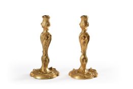 A PAIR OF FRENCH LOUIS XV STYLE ORMOLU CANDLESTICKS, LATE 19TH CENTURY