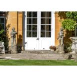 A PAIR OF STONE COMPOSITION FIGURES ON PEDESTALS, ATTRIBUTED TO AUSTIN & SEELEY, 19TH CENTURY