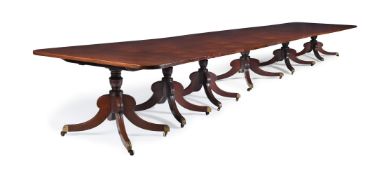 A MAHOGANY SIX PEDESTAL DINING TABLE, IN REGENCY STYLE, 20TH CENTURY