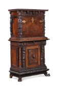 AN ITALIAN CARVED WALNUT AND BURR WALNUT SECRETAIRE CABINET, 17TH CENTURY