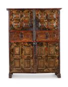 A SPANISH OAK, PINE AND POLYCHROME PAINTED PRESS CUPBOARD, BASQUE, CIRCA 1680