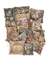 A GROUP OF FOURTEEN TAPESTRY PANEL CUSHIONS, 18TH CENTURY AND LATER