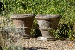 A PAIR OF STONE COMPOSITION PLANTERS, 20TH CENTURY